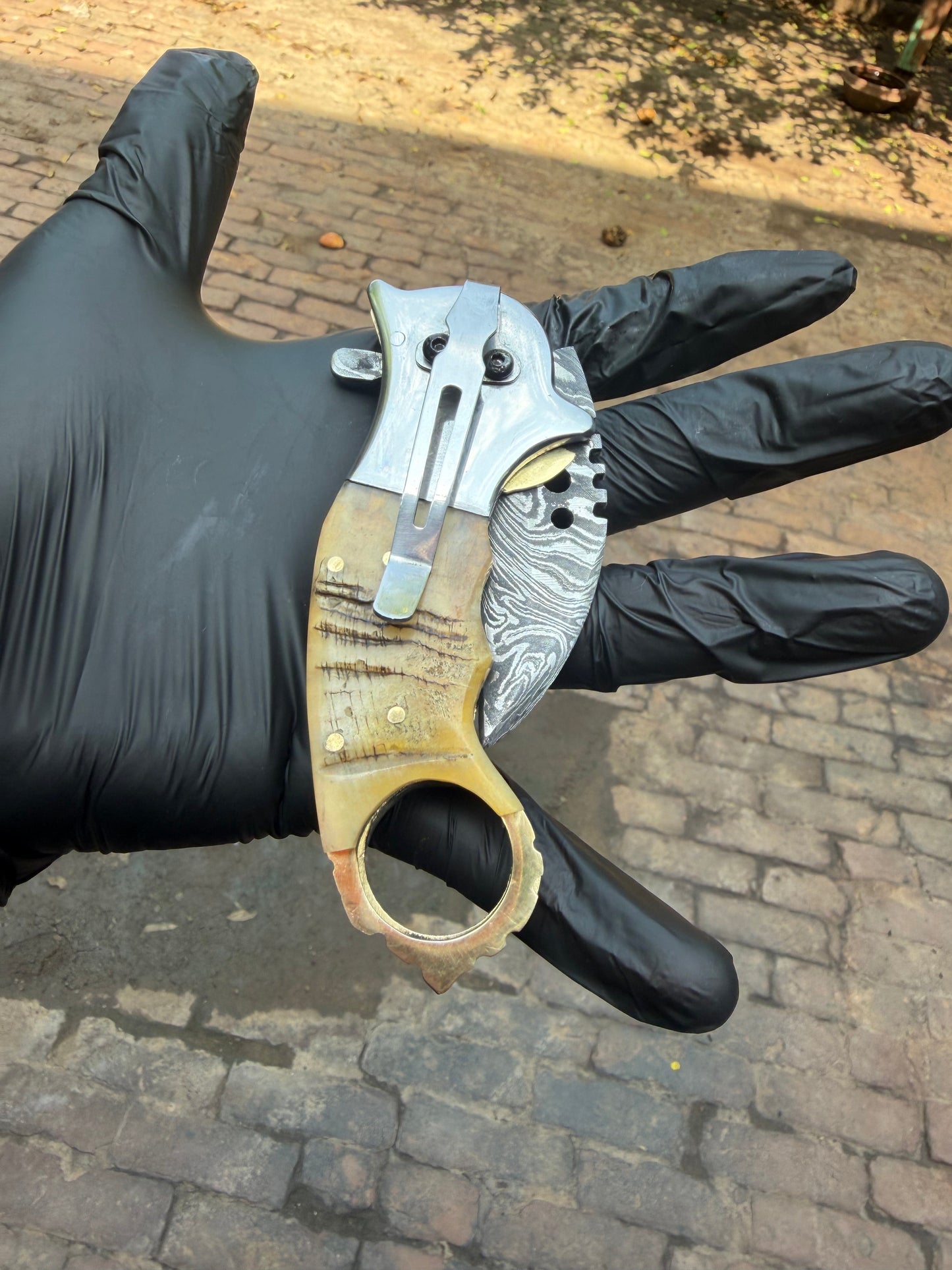 Wolf Claw Damascus Folding Karambit with Engraved Wolf Bolster 