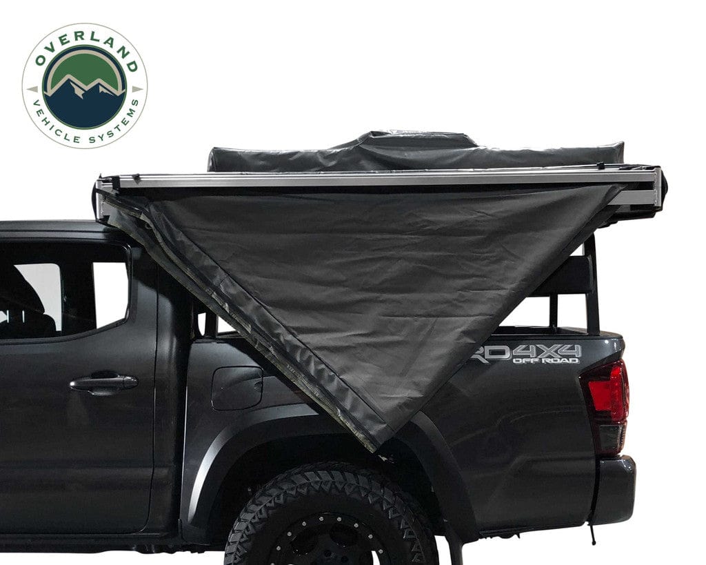 Overland Vehicle Systems Overland Vehicle Systems Nomadic Awning 180 Dark Gray Cover With Black Transit Cover