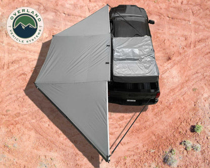 Overland Vehicle Systems Overland Vehicle Systems Nomadic Awning 180 Dark Gray Cover With Black Transit Cover